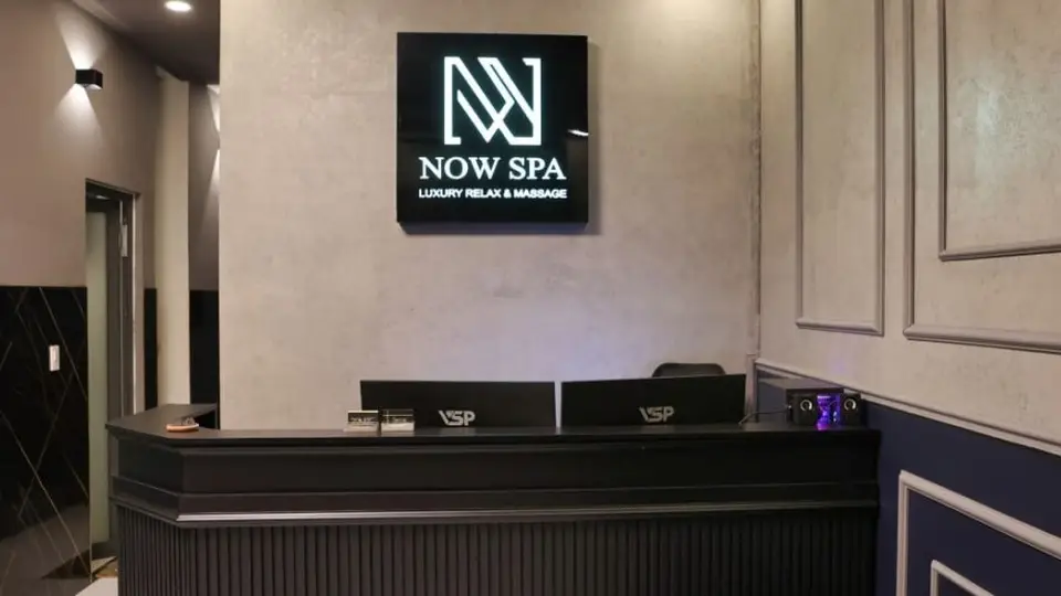 Reception desk of Now Spa Nha Trang with its signature logo